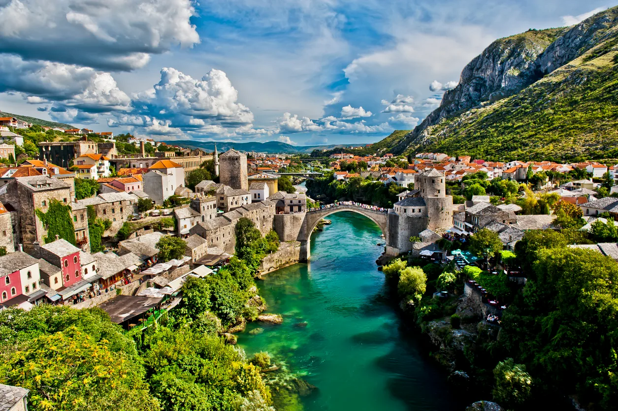 A panoramic view of Mostar’s Old Bridge and the turquoise Neretva River