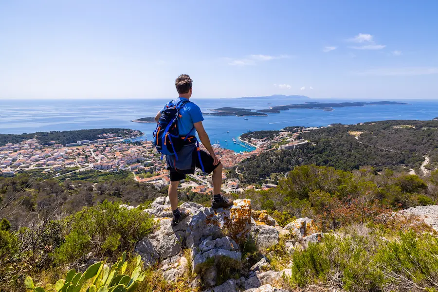 Croatian coastal hiking trail overlooking Adriatic Sea - scenic adventure tour through national parks and islands