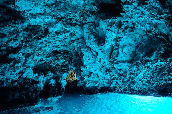 Blue Cave Croatia - glowing azure water inside cave on Bisevo island