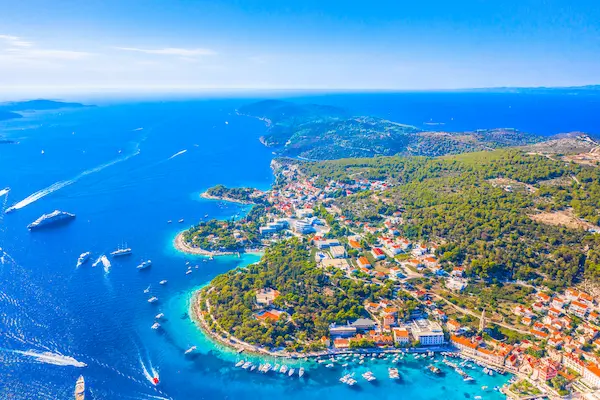 Hvar town Croatia - aerial view of historic harbor and Spanish fortress