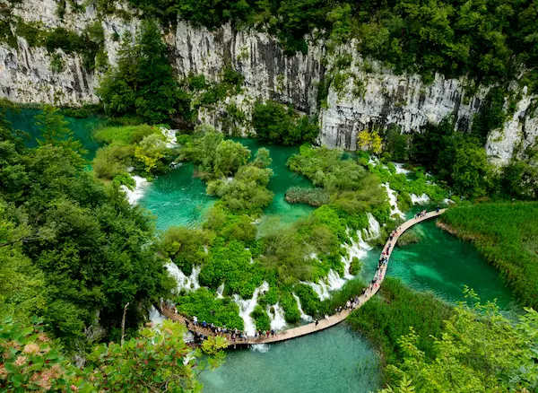 Plitvice Lakes Croatia - UNESCO waterfalls cascading through emerald forest
