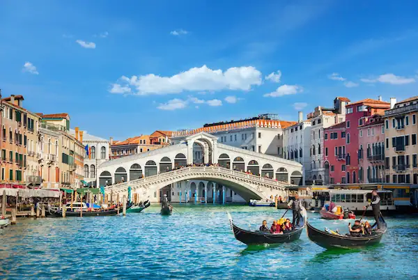 Bridge over Grand Canal with gondolas Venice Italy