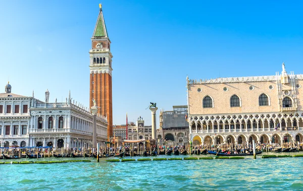 St. Mark's Square and Campanile bell tower Venice Italy from water