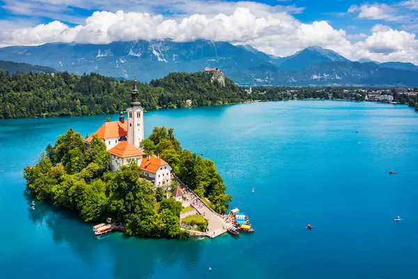 Lake Bled with island church and Bled Castle Slovenia Julian Alps